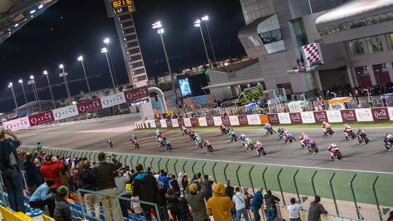 Packed floodlit grandstand at the MotoGP night race in Lusail, Qatar 