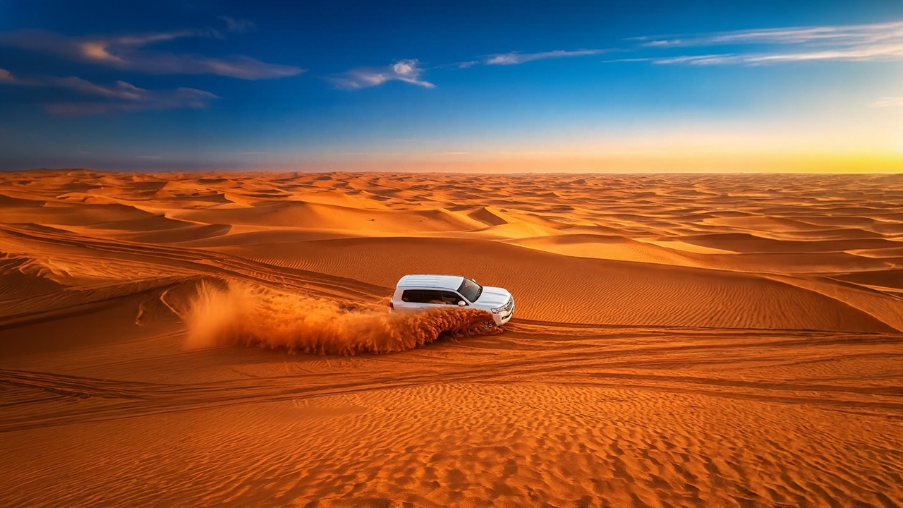 4x4 dune bashing on a desert safari in Doha, Qatar