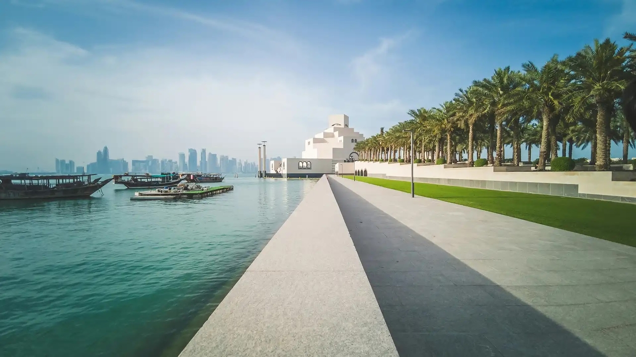 Doha Corniche waterfront promenade with dhow boats and Museum of Islamic Art