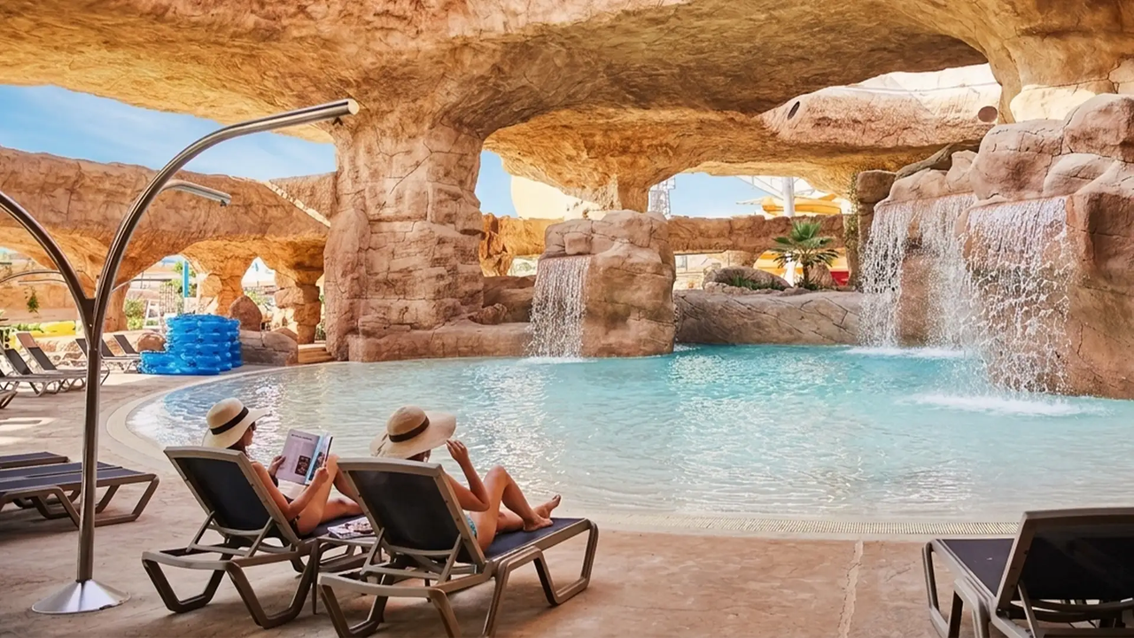 Rock grotto pool and waterfalls at Desert Falls Water and Adventure Park
