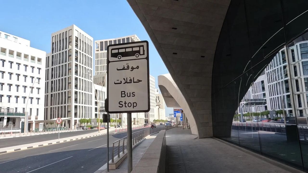 Modern street view and bus stop sign in Msheireb, Doha.