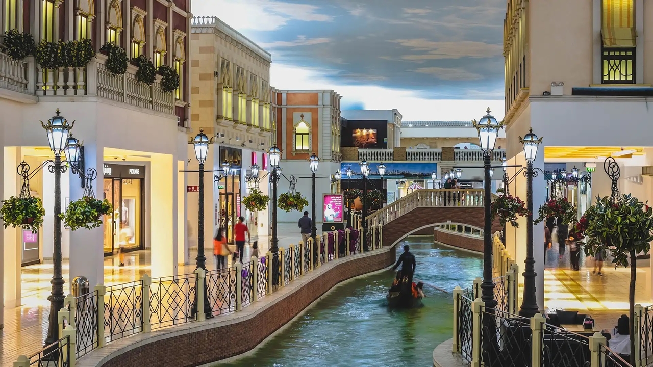 Indoor gondola canal and Venetian-style shops inside Villaggio Mall Doha
