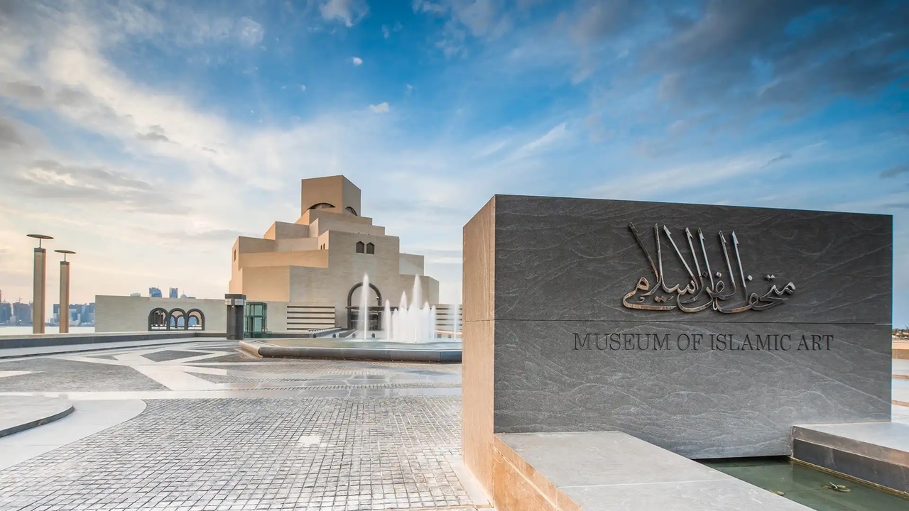 Museum of Islamic Art entrance plaza with fountains and the museum si